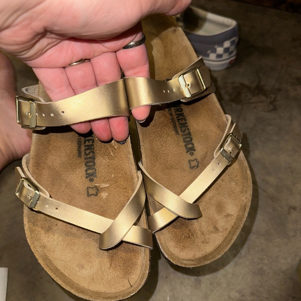 Gold crossover Birkenstock sandals